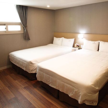 Business Hotel Haeundae S Busan Bagian luar foto